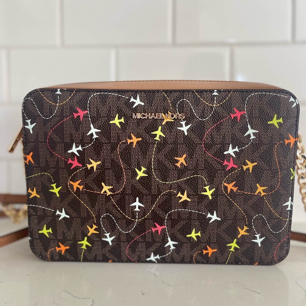 Michael Kors Jet Set Logo Airplanes LG EW Crossbody Brown *RARE* NWT